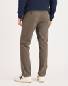 Back view of model wearing Chocolate Chip Ultimate Chinos, Slim Fit.