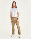 Front view of model wearing Otter Men's Straight Fit Utility Pants.