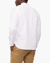 Back view of model wearing Paper White Men's Slim Fit 2 Button Collar Shirt.